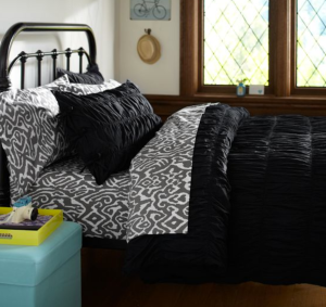 I can't say enough about how much I love this duvet cover.  The black makes it chic and modern, while the ruche adds just the right touch of feminine.  (Ruched Duvet Cover + Sham, Pottery Barn Teen)