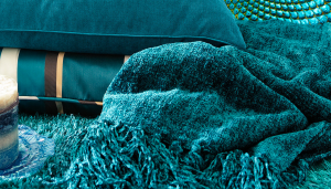 I don't care that it's "machine wash only."  This chenille throw is literally the softest thing in the entire world, and I can't wait to snuggle up in it with a cup of hot chocolate during the colder months.  (Chenille Throw in Shaded Spruce, Pier One Imports)